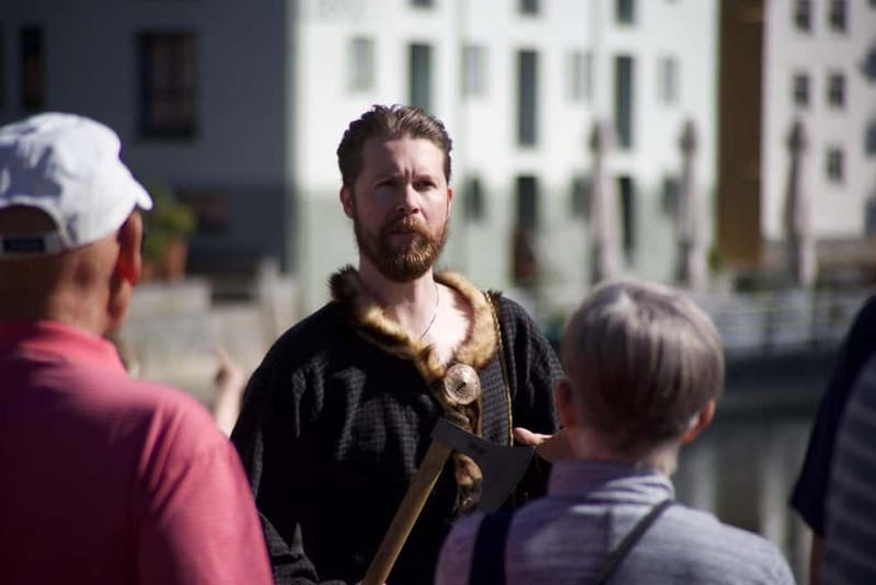 Alesund: Viking Tour with Ship Experience and Tasting - Climbing Aboard a Genuine Viking Ship in Ålesund’s Brosundet Channel