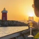 Alghero: sunset sailing tour with aperitif - Exploring Algheros Coastline on a Vintage Sailboat