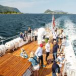 All About the Fjords, in one tour by boat & bus from Ålesund - Experience the Serene Fjord Cruise through Hjørundfjord