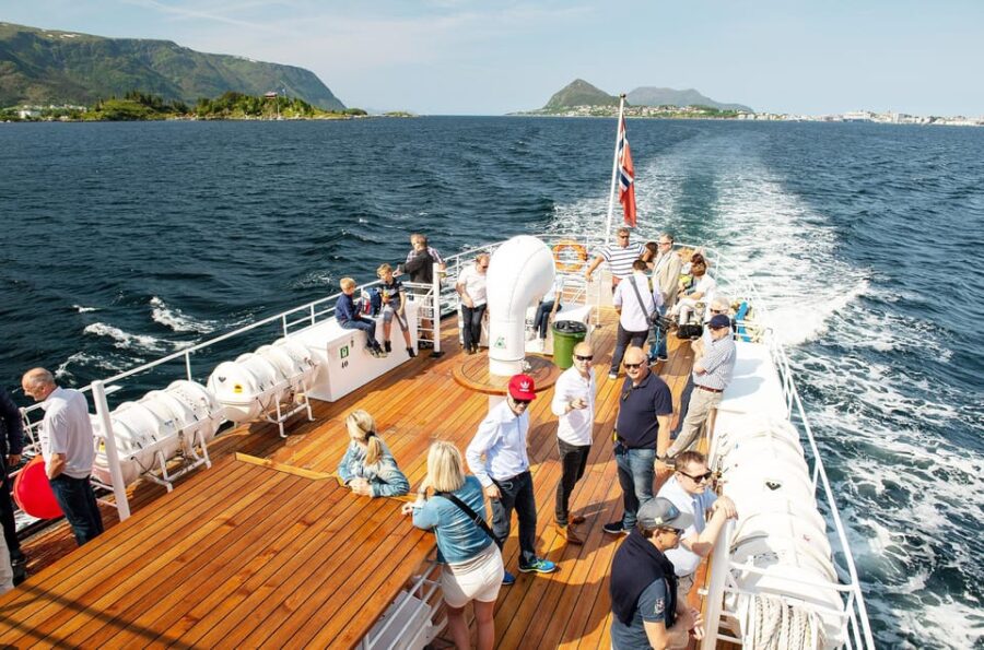 All About the Fjords, in one tour by boat & bus from Ålesund - Experience the Serene Fjord Cruise through Hjørundfjord