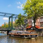 Amsterdam 1h Canal Cruise by Semi-Open Boat with Audio Guide - Exploring Amsterdam’s Historic Waterfronts and Landmarks