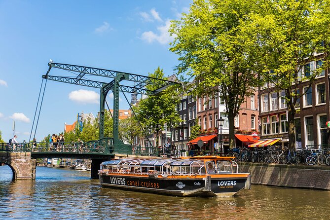 Amsterdam 1h Canal Cruise by Semi-Open Boat with Audio Guide - Exploring Amsterdam’s Historic Waterfronts and Landmarks