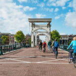 Amsterdam Bike Tour in Small Group + Optional Canal Cruise - Exploring Amsterdam’s Iconic Landmarks and Districts