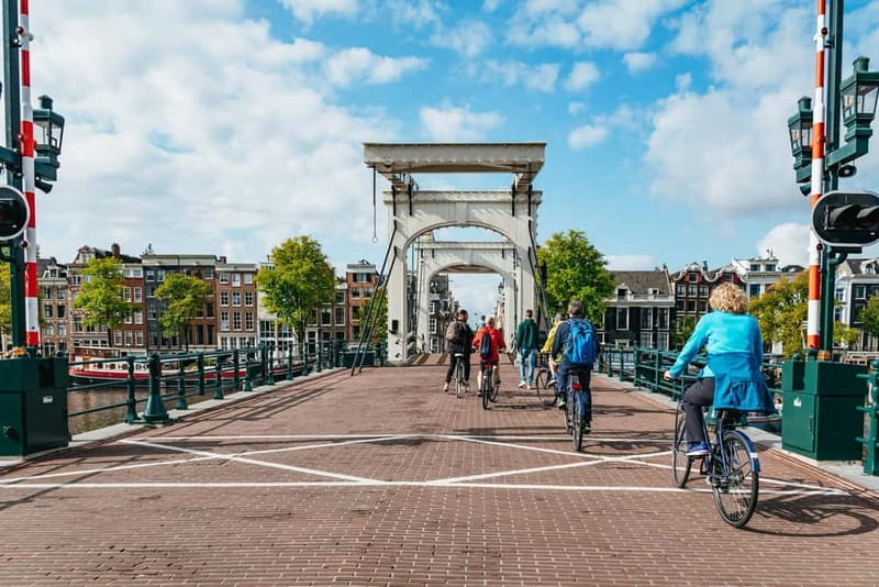 Amsterdam Bike Tour in Small Group + Optional Canal Cruise - Exploring Amsterdam’s Iconic Landmarks and Districts