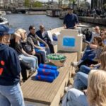 Amsterdam: City Highlights Small Boat Canal Cruise with host - Starting at Rembrandt Square, the Heart of Amsterdam