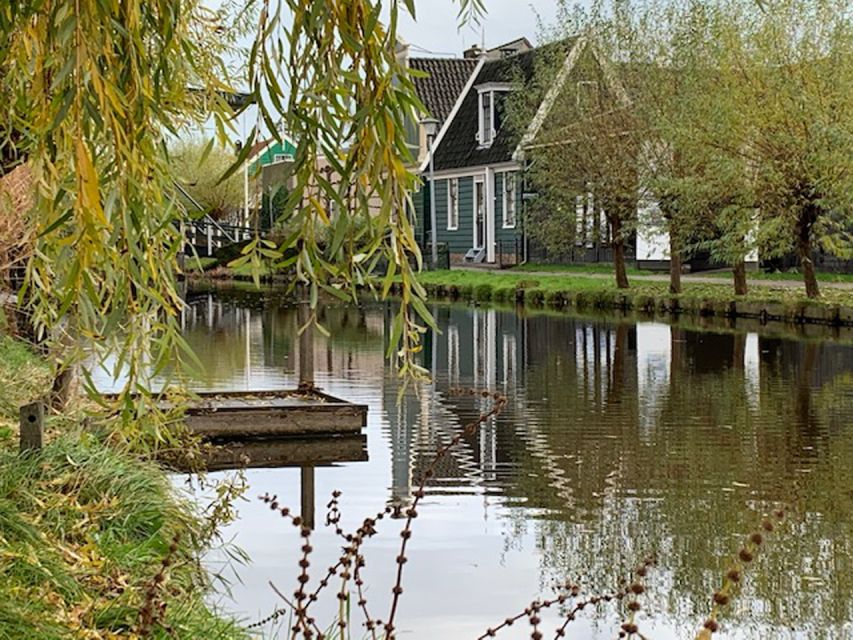 Amsterdam: Countryside Bike Tour and Zaanse Schans Windmills - Visiting Authentic Windmills Beyond Tourist Areas