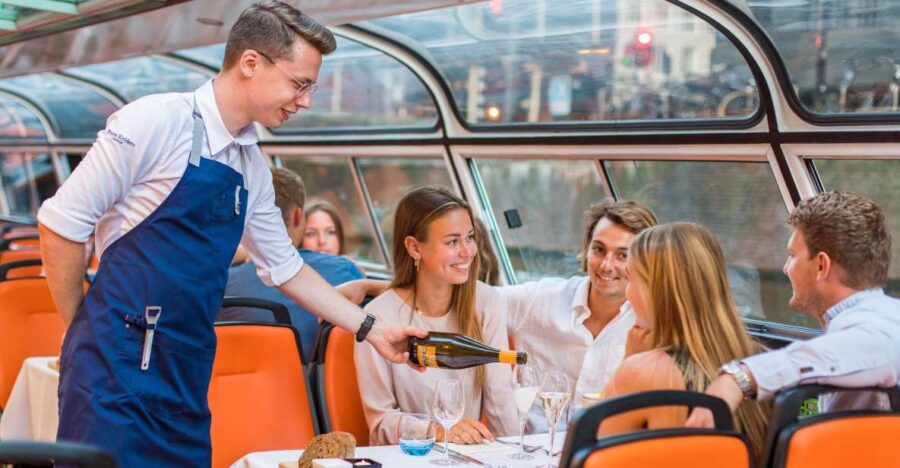 Amsterdam: Dinner Cruise with 4-Course Menu - Navigating the Elegant Amsterdam Canal Route