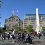 Amsterdam: E-Bike Sightseeing Tour - Central Meeting Point at Dam Square Sets the Tone