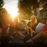 Amsterdam Evening Canal Cruise with Live Guide and Onboard Bar - Navigating the Routes and Key Landmarks