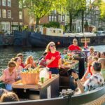 Amsterdam: Guided Open Boat Canal Cruise Including 1 Drink - The Full Itinerary: Diverse Stops Along Amsterdams Historic Waterways