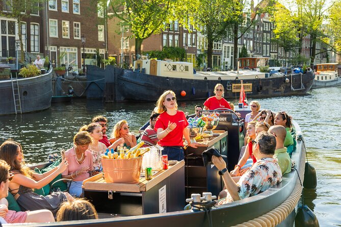 Amsterdam: Guided Open Boat Canal Cruise Including 1 Drink - The Full Itinerary: Diverse Stops Along Amsterdams Historic Waterways