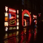 Amsterdam: Guided Red Light District and City Walking Tour - Visiting Amsterdam’s Oldest Architectural Landmarks