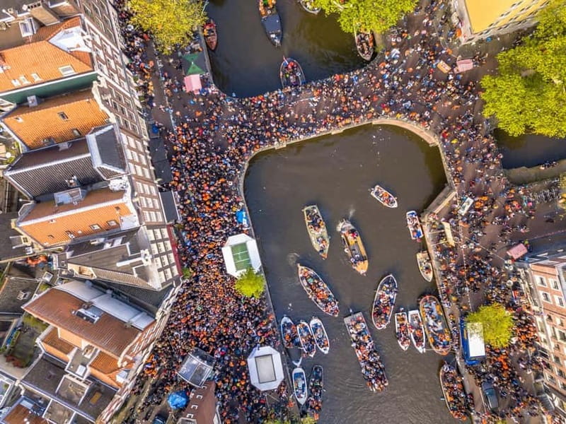 Amsterdam: Kings Day Boat Party with Unlimited Drinks - Starting Point at Stationsplein 40