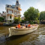 Amsterdam: Luxury Canal Cruise Unlimited Drinks & Bites Option - Pass By Famous Landmarks and Neighborhoods