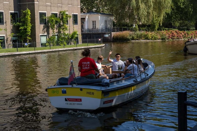 Amsterdam: Open Boat Canal Cruise (with Free Spritz Option) - The Skipper: Local Guides with Storied Insights