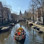 Amsterdam: Premium Tulip Boat Canal Tour - Set out on a One-Hour Luxury Canal Cruise in Amsterdam