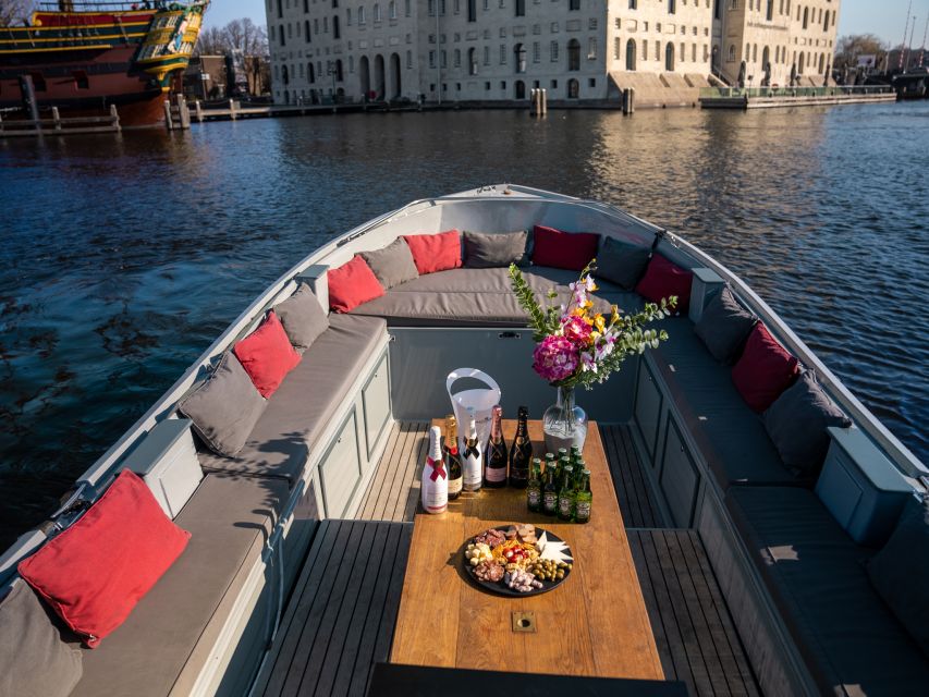 Amsterdam: Private Luxury Cruise with Pizza and Drinks - How the Private Canal Cruise Sails Past Amsterdam’s Famous Landmarks