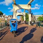 Amsterdam: Private Pedicab Historical Sightseeing Tour - Starting at Dam Square, the Heart of Amsterdam