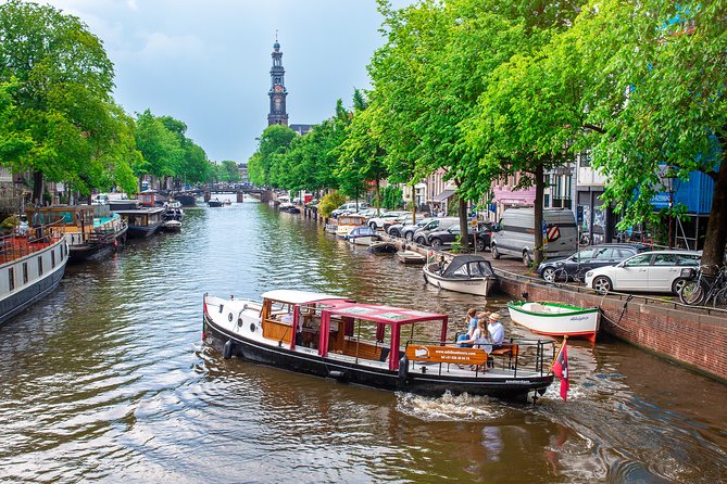 Amsterdam Small-Group Canal Cruise With Dutch Snacks and Drink - Visiting Key Landmarks from the Water