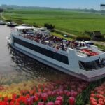Amsterdam: Tour to Keukenhof Gardens with Windmill Cruise - From the Windmill Cruise to the Blooming Keukenhof Gardens