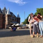 Amsterdam: Treasure Hunt Walking Tour "A Secret Sender" - Starting Point at Mystery City Games on Waterlooplein