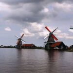 Amsterdam: Volendam, Windmill, and Cheese Farm Private Tour - Exploring Zaanse Schans: Windmills and Traditional Structures