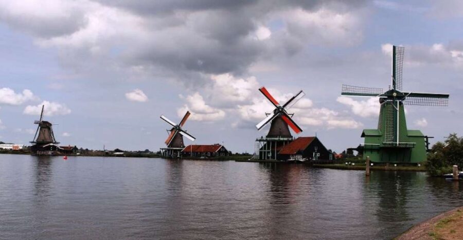 Amsterdam: Volendam, Windmill, and Cheese Farm Private Tour - Exploring Zaanse Schans: Windmills and Traditional Structures