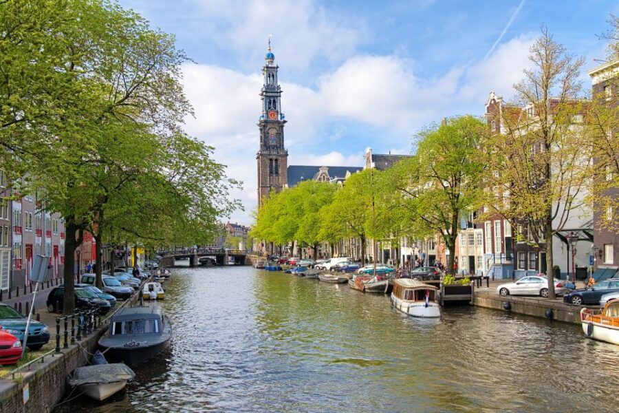 Amsterdam Walking Tour and Canal Cruise - Visiting a Famous Local Street Market