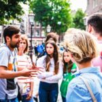 Amsterdam: Walking Tour with Dutch Pancake Lunch - Exploring Amsterdam’s Historic Landmarks and Neighborhoods