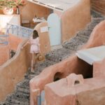 Archaeological Bus Tour To Akrotiri Excavations & Red Beach - From the Prophet Elias Monastery to Traditional Villages