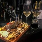 Athens by Night: Small Group Sightseeing with Drinks and Food Tasting - Savoring Local Wines at Cinque Wine Tastings