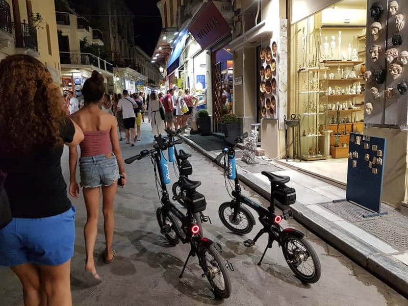 Athens: Discover the City Electric Bike Night Tour - Visiting Athens Trilogy, Old Library, and University