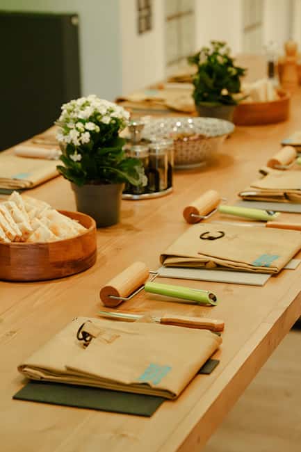 Athens Market Tour and Cooking Class in a Beautiful Garden - Exploring Monastiraki Square and Its Vibrant Atmosphere