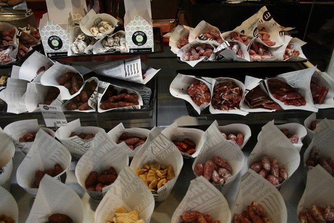 Barcelona Food Tour: Market & Gothic Quarter with Expert Guide - Visiting Plaça del Rei and Roman Remnants