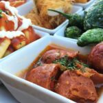 Barcelona Food Tour: Tapas, Drinks and Delights with a Local - Visiting Plaça de lÀngel and La Ramblas Surroundings