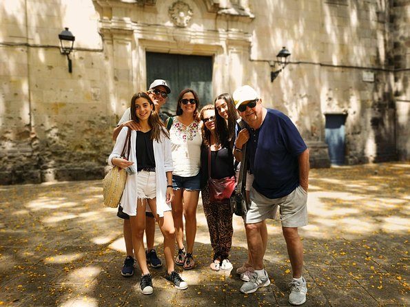 Barcelona Highlights & Secrets Private Tour with Tapa & Drink - Discovering La Rambla’s Lively Atmosphere