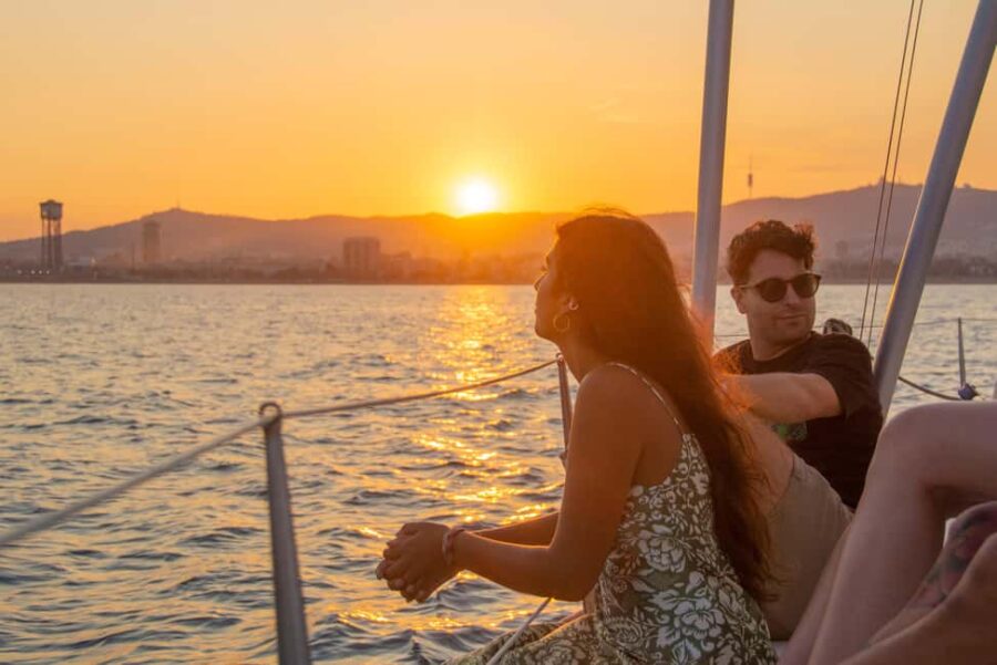 Barcelona: Sailing boat ride with sunset, wine and snacks - Enjoy Mediterranean Sunset Views from the Deck