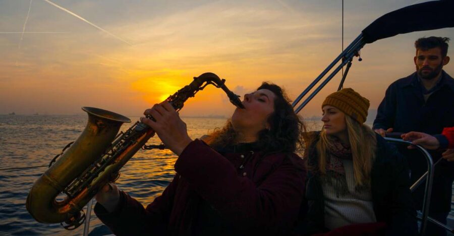 Barcelona: Sunset Live Sax and Sailing Experience with Tapas - Starting Point and Check-In at Port Olimpic