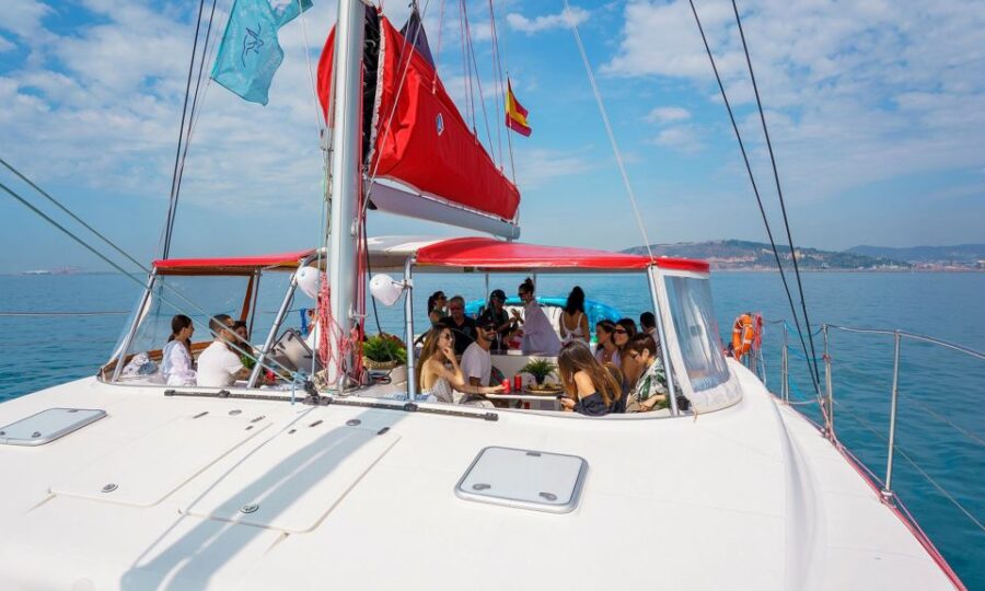 Barcelona: Sunset or Day Catamaran Cruise with Tapa & Drink - Sunset and Daytime Swimming: Two Unique Experiences