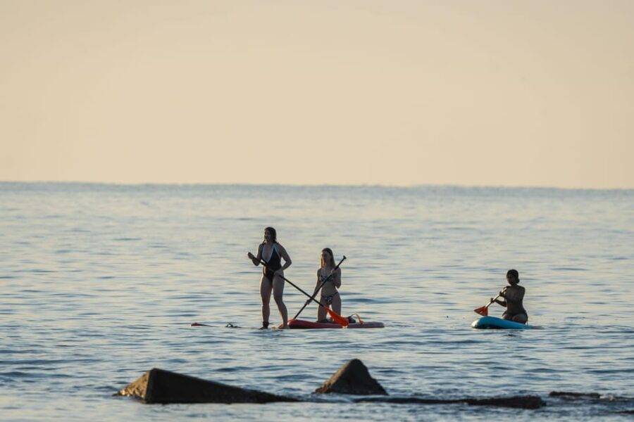 Barcelona: Sunset Paddleboarding Experience with 1 Beer - Starting Point at Carrer de Grau i Torras, 23