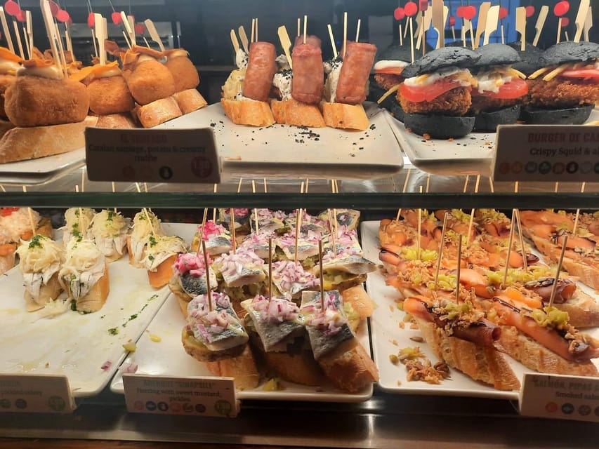 Barcelona: Tapas and Pintxos Tour with Crema Catalana - Exploring a Hidden Barcelona Neighborhood Favored by Locals