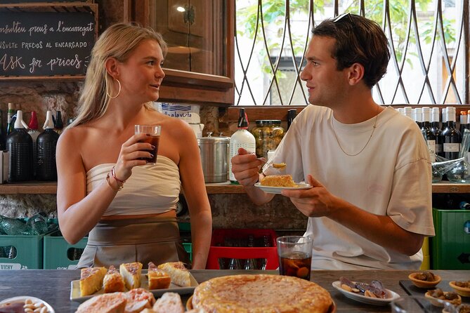 Barcelona Tapas and Wine Experience Small-Group Walking Tour - Visiting Four Iconic Gastronomic Stops in Barcelonas Old City