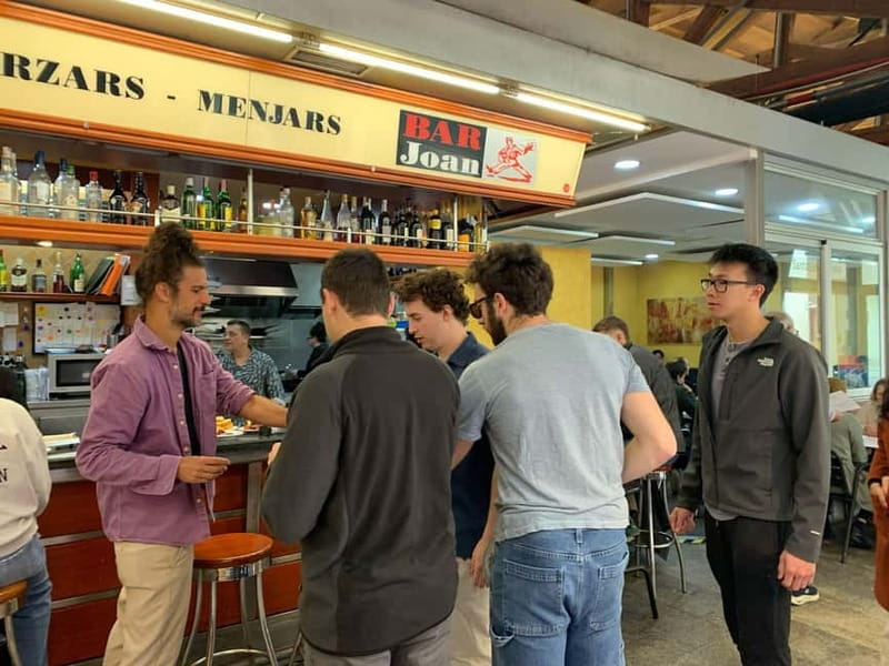 Barcelona: Tasty Street Food and Sightseeing Guided Tour - Visiting Mercat de la Boqueria: A Colorful Food Wonderland