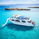 BBQ Boat: Nafsika II Sunset BBQ, Waterslide & Swimming Trip - Navigating Along the Cyprus Coast: Sites and Views