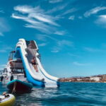 Benalmádena Boat Tour with Snorkeling, Water Slide and Lunch - Encountering Dolphins in the Wild Near Benalmádena