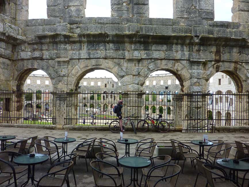 Best of Pula Private Walk Tour with a Professional Guide - Walking Through Pula’s Ancient Roman Monuments