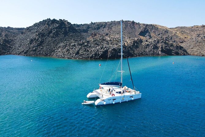 Best of Santorini Private Half-Day Catamaran Cruise with transfer and meal - Exploring Santorini’s Iconic Beaches: Red and White