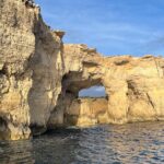 Blue Lagoon Ferry and Caves Tour - Cave Views and Scenic Passages on the Return