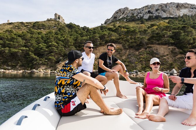 Boat excursion in Cagliari: 3 amazing hours! - Navigating Under the Sella del Diavolo and Snorkeling in Quiet Waters