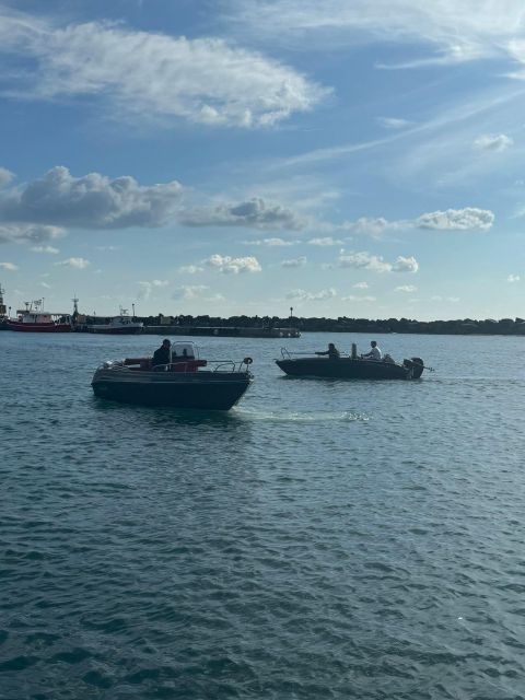 Boat Rental (Crewed) Cobra 5.0 - Discover the Classic Spots of Santorini by Boat